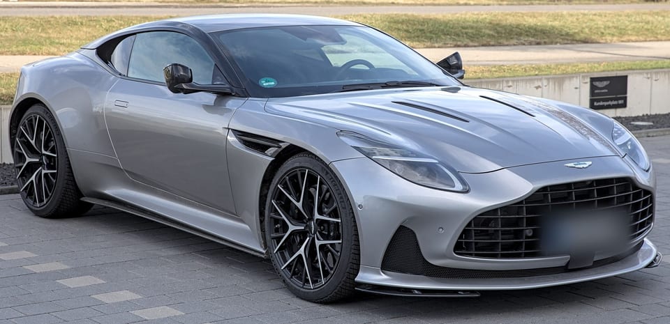 Silver Aston Martin DB12 coupe, front three-quarter view